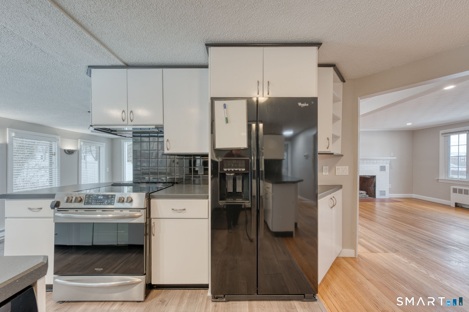 11 Charter Road Wethersfield, CT 06109 - Photo 16 of 40 a kitchen with a sink cabinets and window