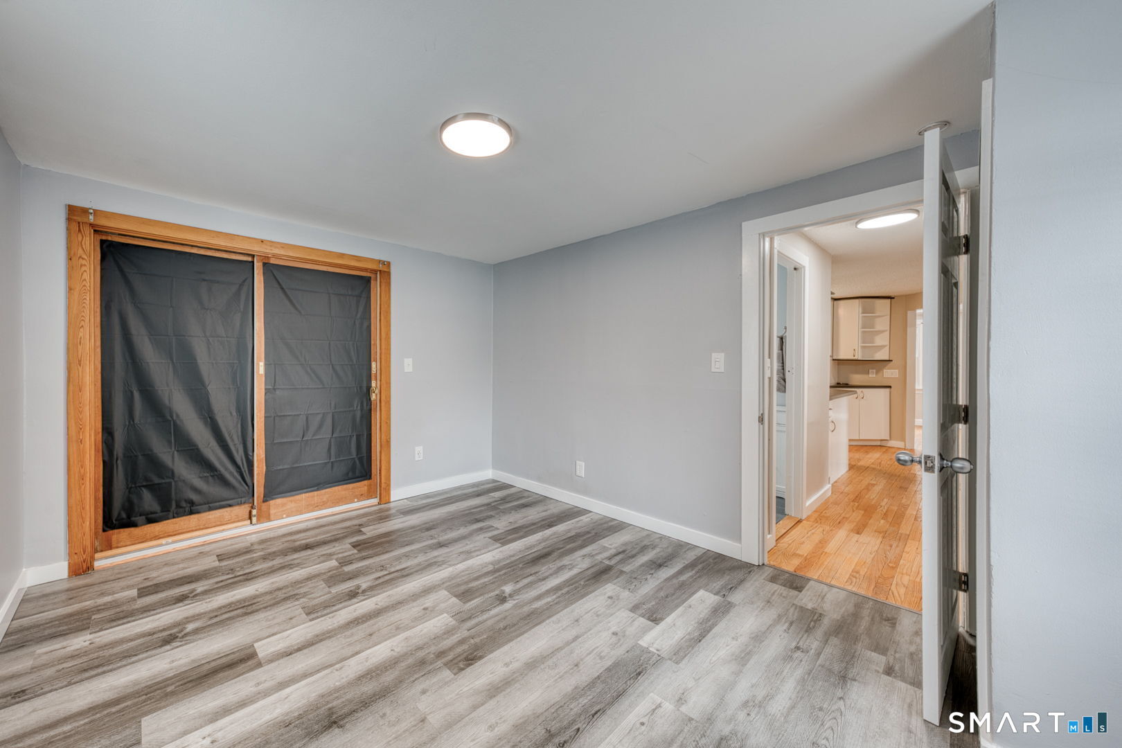 11 Charter Road Wethersfield, CT 06109 - Photo 24 of 40 a view of an empty room and wooden floor