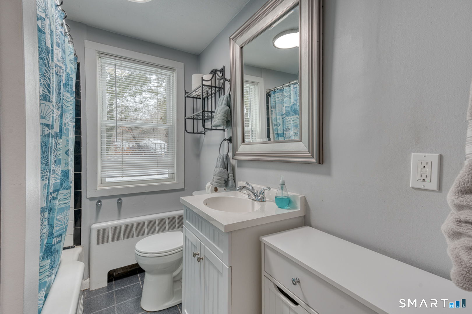 11 Charter Road Wethersfield, CT 06109 - Photo 26 of 40 a bathroom with a sink toilet and window
