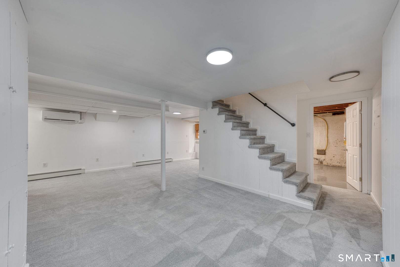 11 Charter Road Wethersfield, CT 06109 - Photo 31 of 40 a view of an empty room with stairs and entrance