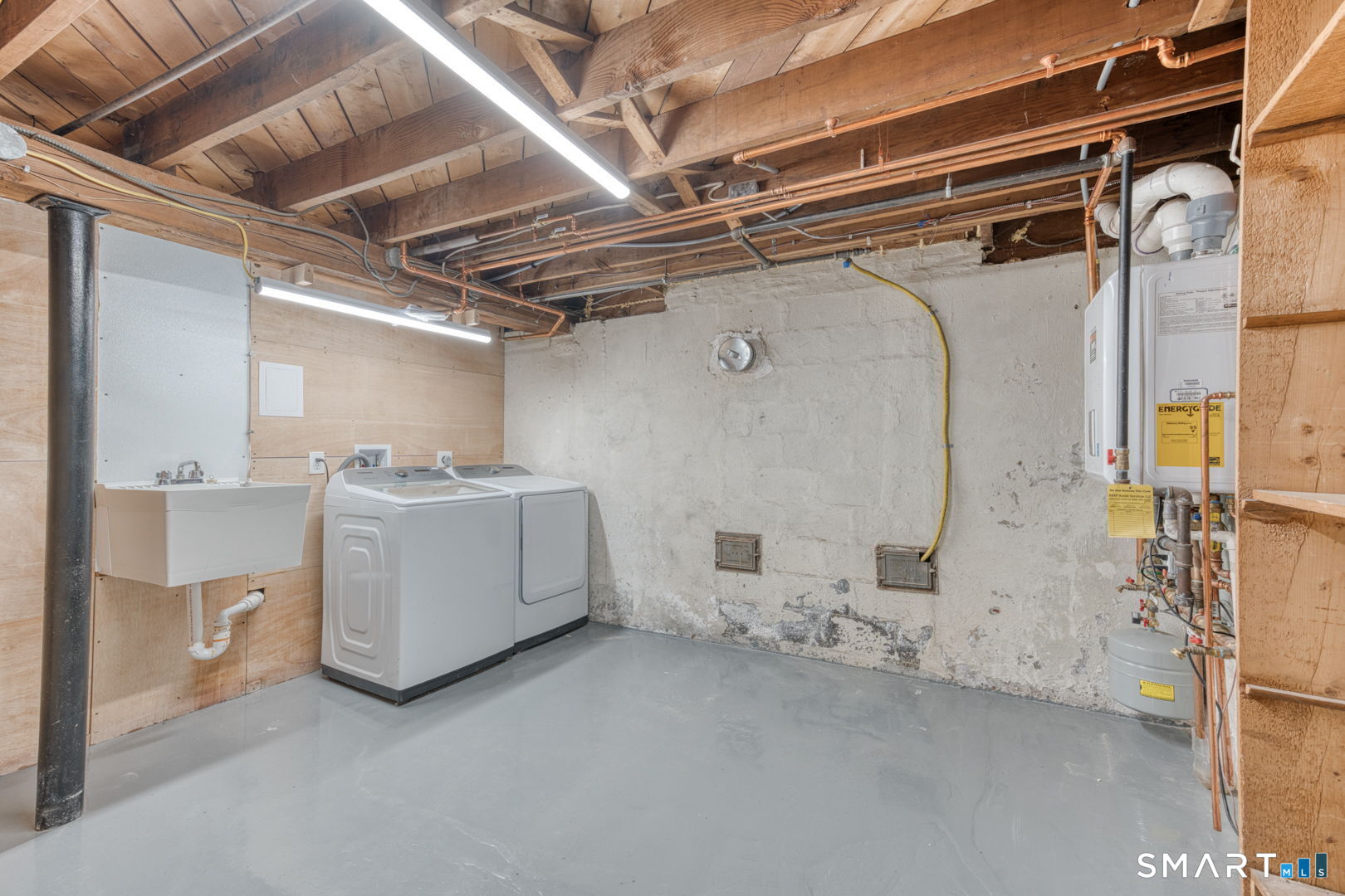 11 Charter Road Wethersfield, CT 06109 - Photo 39 of 40 a utility room with dryer and washer