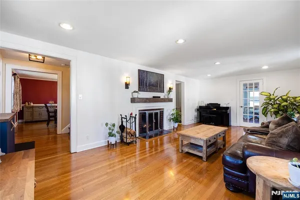 a kitchen with stainless steel appliances a stove microwave and cabinets