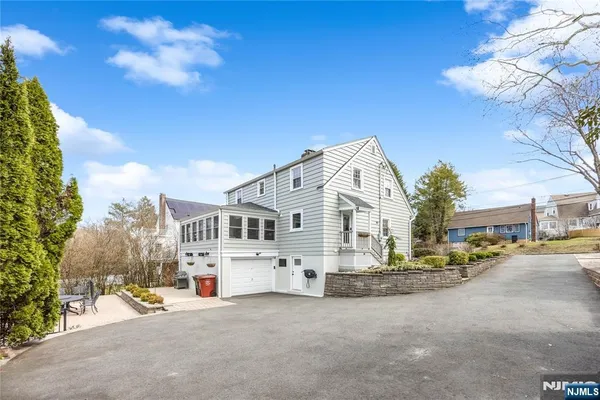a view of a backyard with a patio