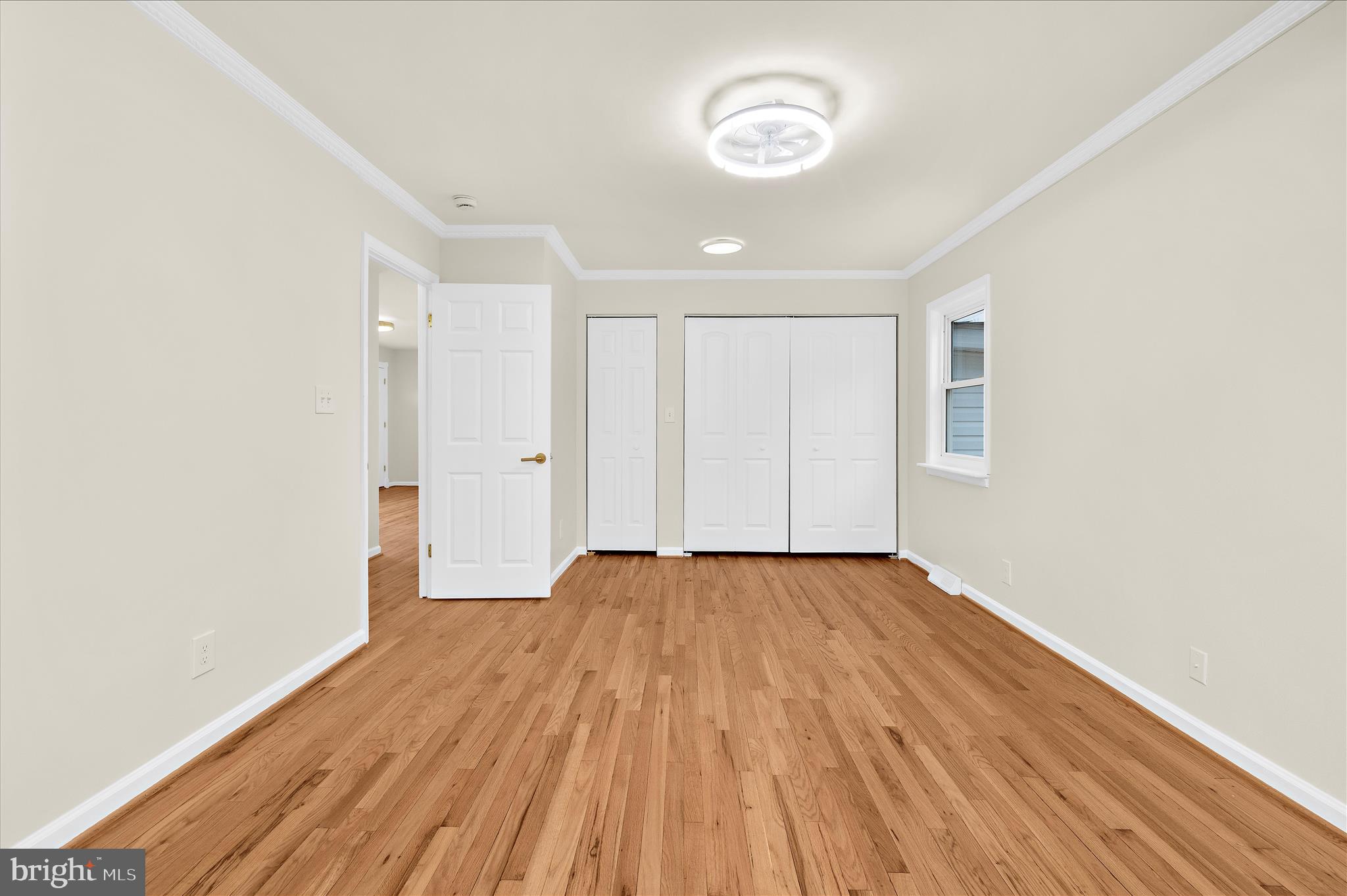 7831 Overhill Road Glen Burnie, MD 21060 - Photo 21 of 57 a view of an empty room with a window