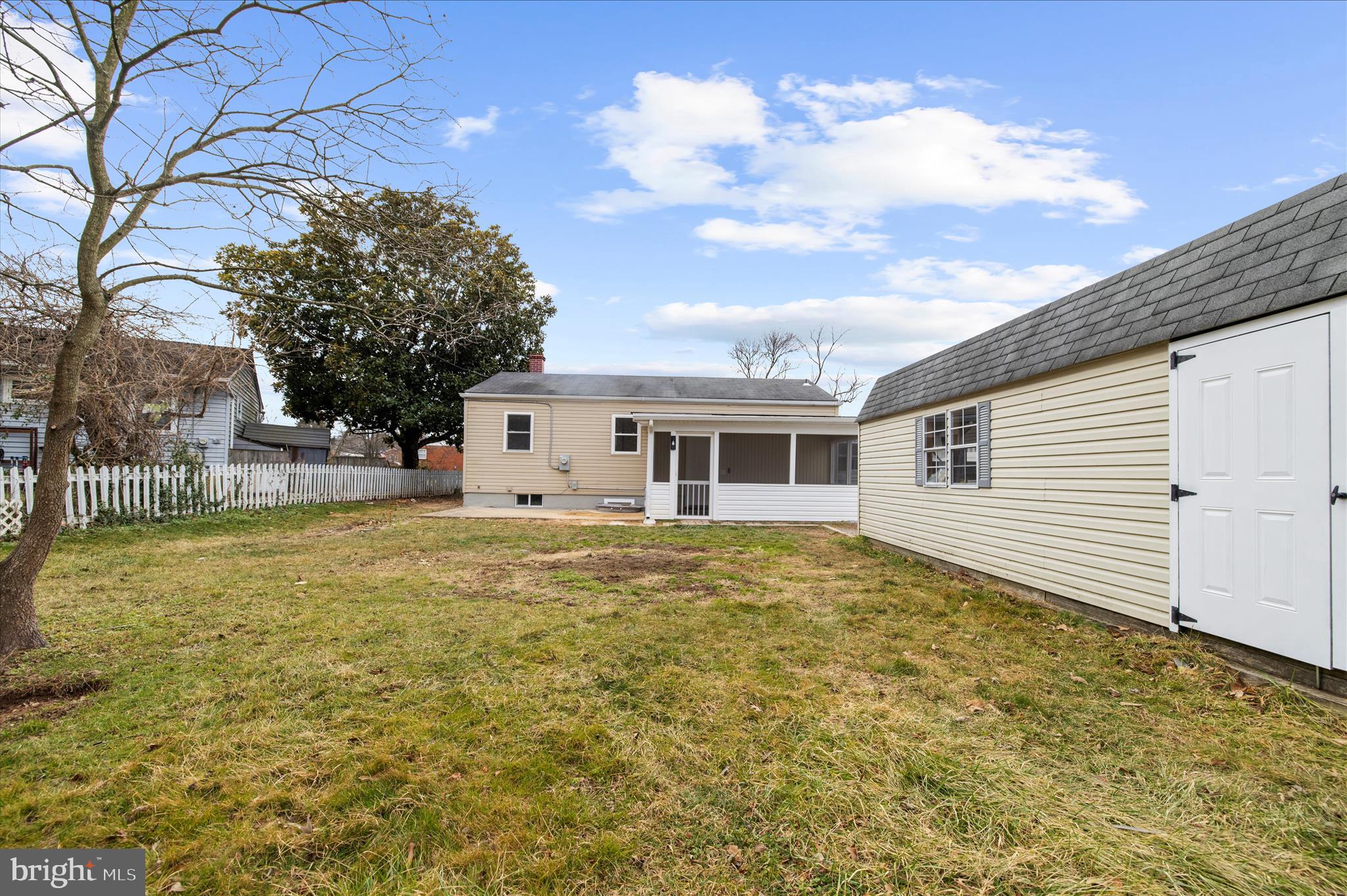 7831 Overhill Road Glen Burnie, MD 21060 - Photo 37 of 57 a front view of a house with a garden