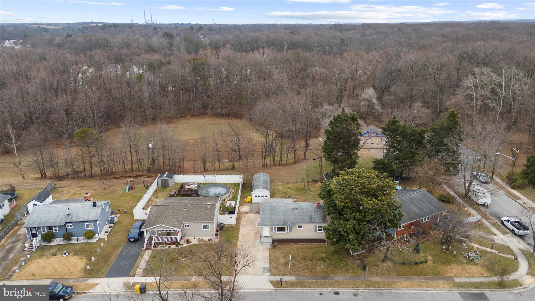 7831 Overhill Road Glen Burnie, MD 21060 - Photo 44 of 57 an aerial view of a house with lots of trees