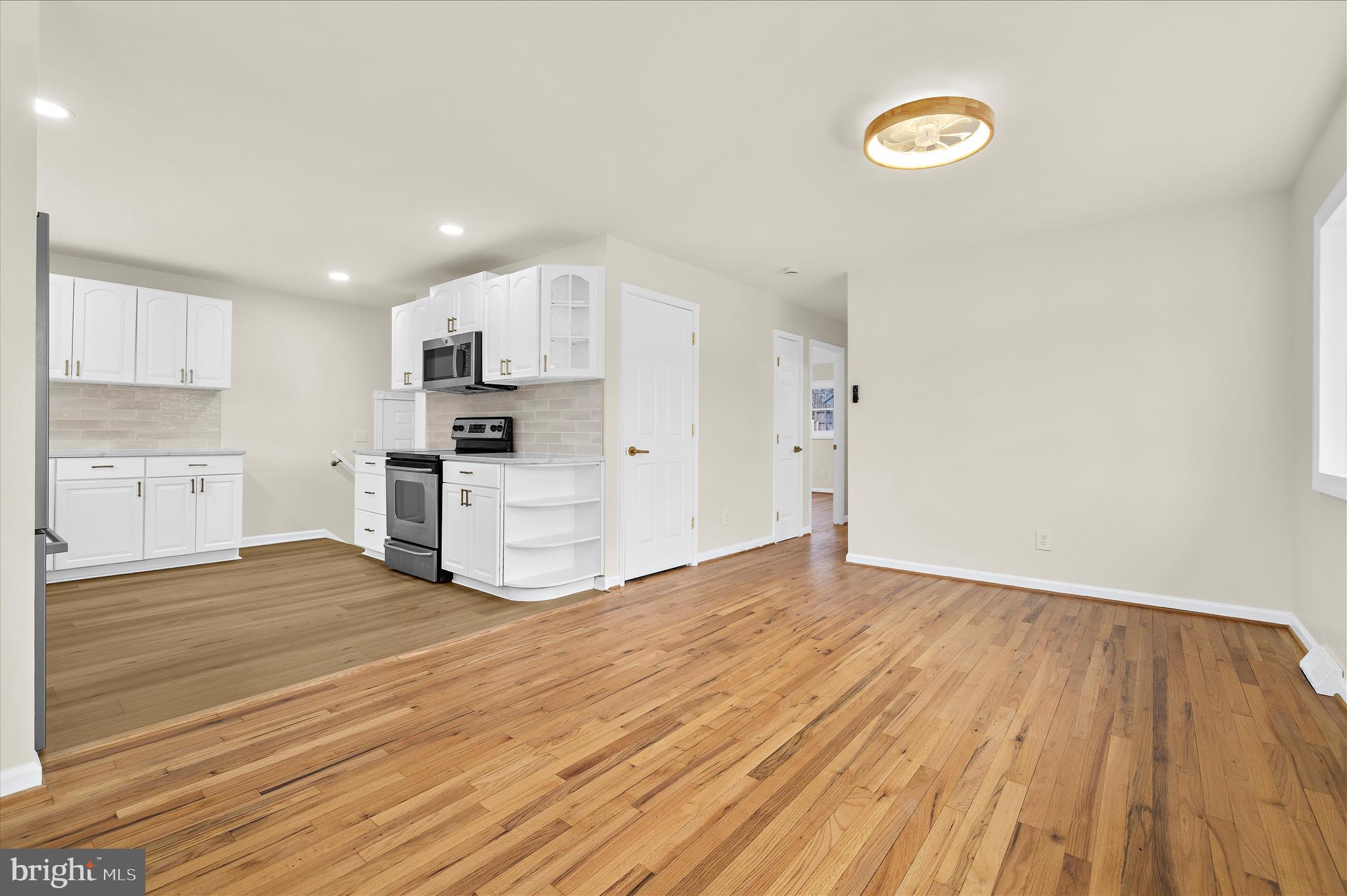 7831 Overhill Road Glen Burnie, MD 21060 - Photo 5 of 57 a view of kitchen with wooden floor
