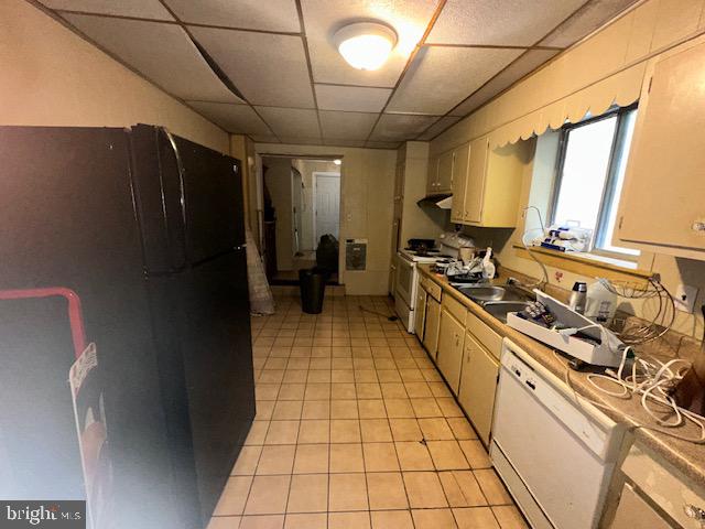 47 South 3rd Street Steelton, PA 17113 - Photo 22 of 26 a kitchen with a stove and a refrigerator