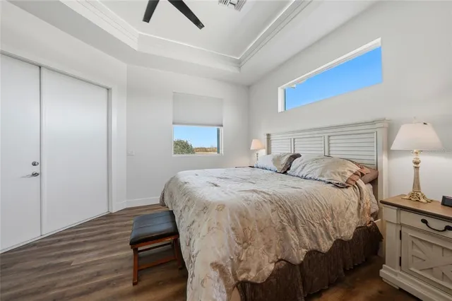 a bedroom with a bed and a lamp