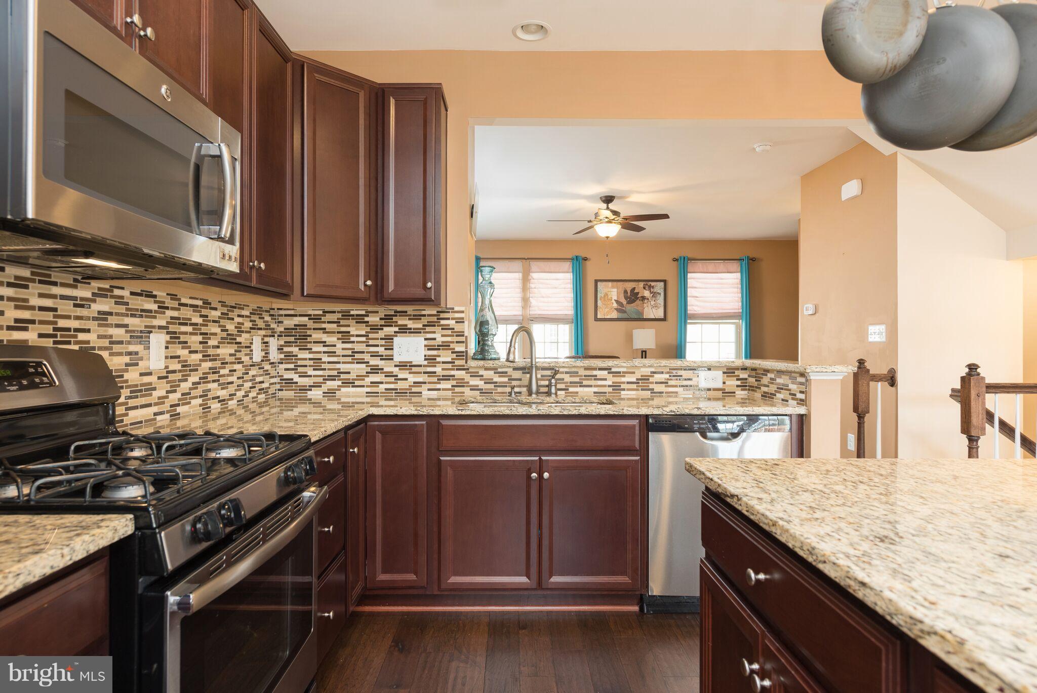 108 Brenton Road Fredericksburg, VA 22405 - Photo 11 of 24 a kitchen with a sink stove and microwave