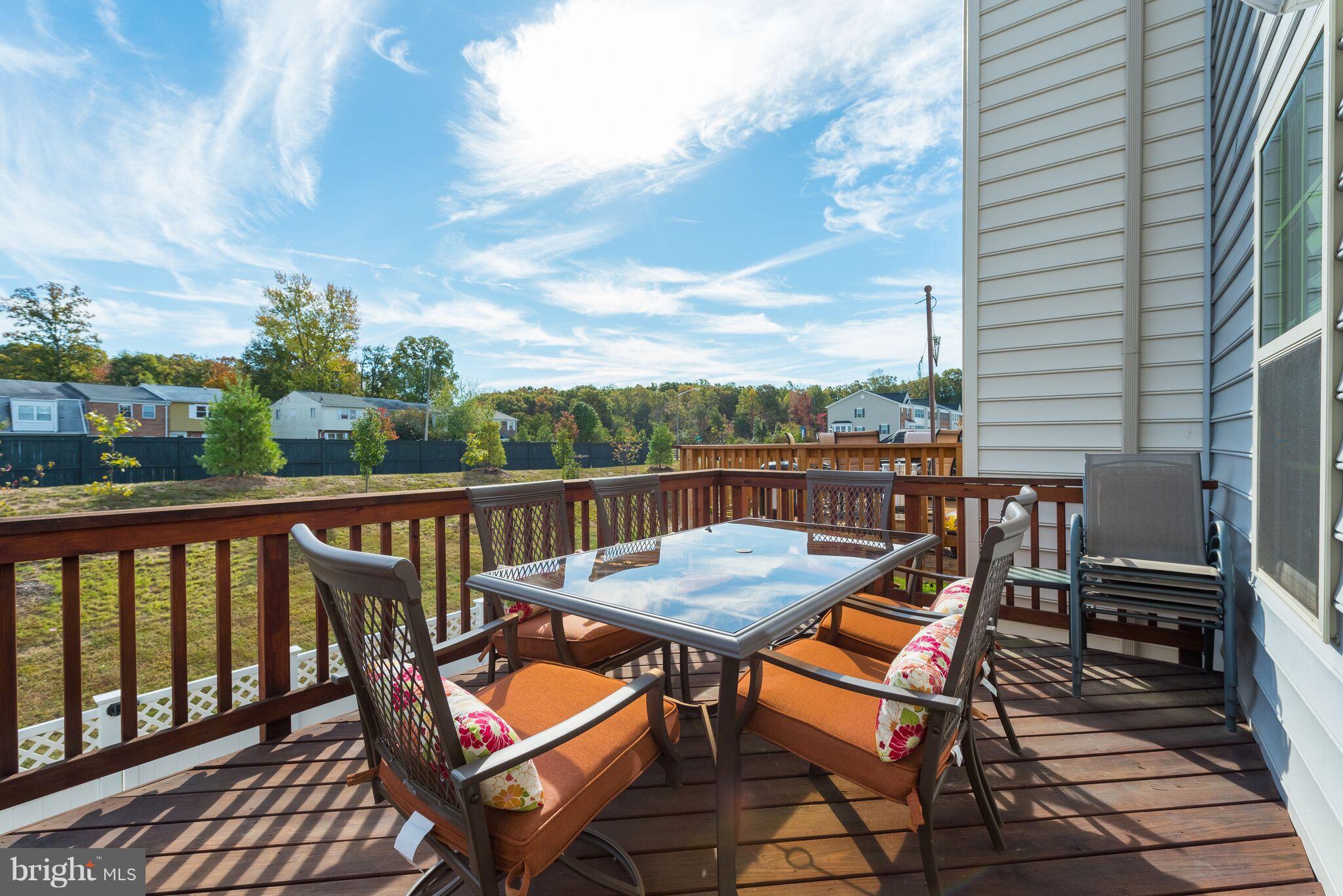 108 Brenton Road Fredericksburg, VA 22405 - Photo 15 of 24 a view of a chairs and table on the deck