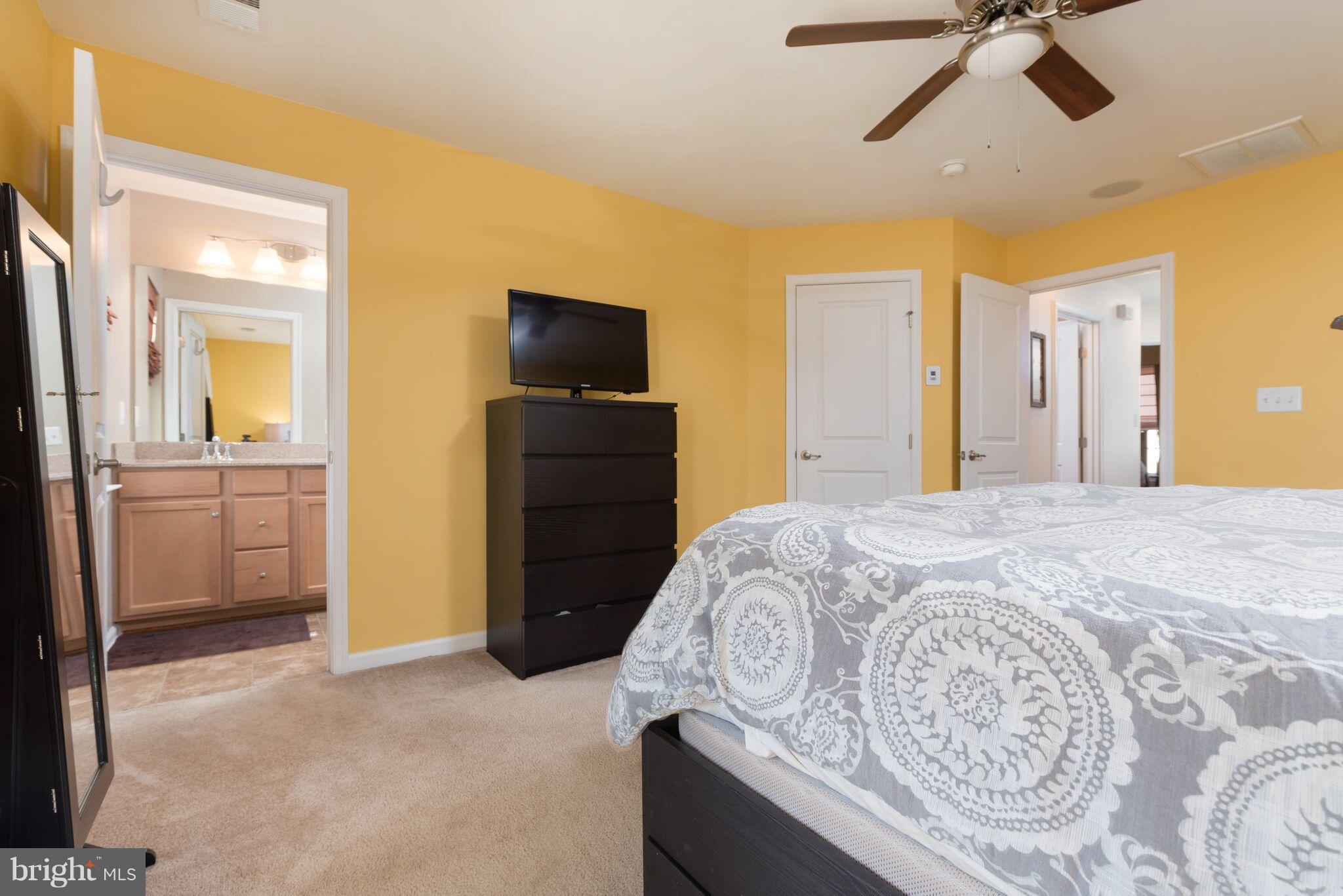 108 Brenton Road Fredericksburg, VA 22405 - Photo 18 of 24 a bedroom with a bed and a television