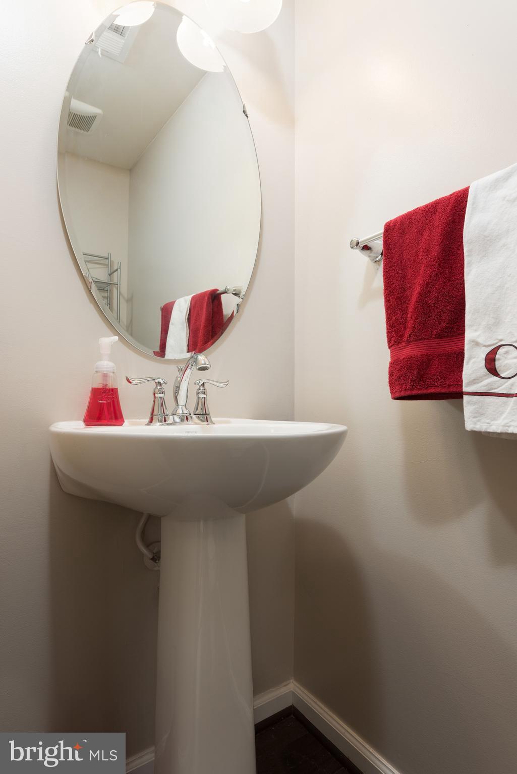 108 Brenton Road Fredericksburg, VA 22405 - Photo 3 of 24 a bathroom with a sink and mirror