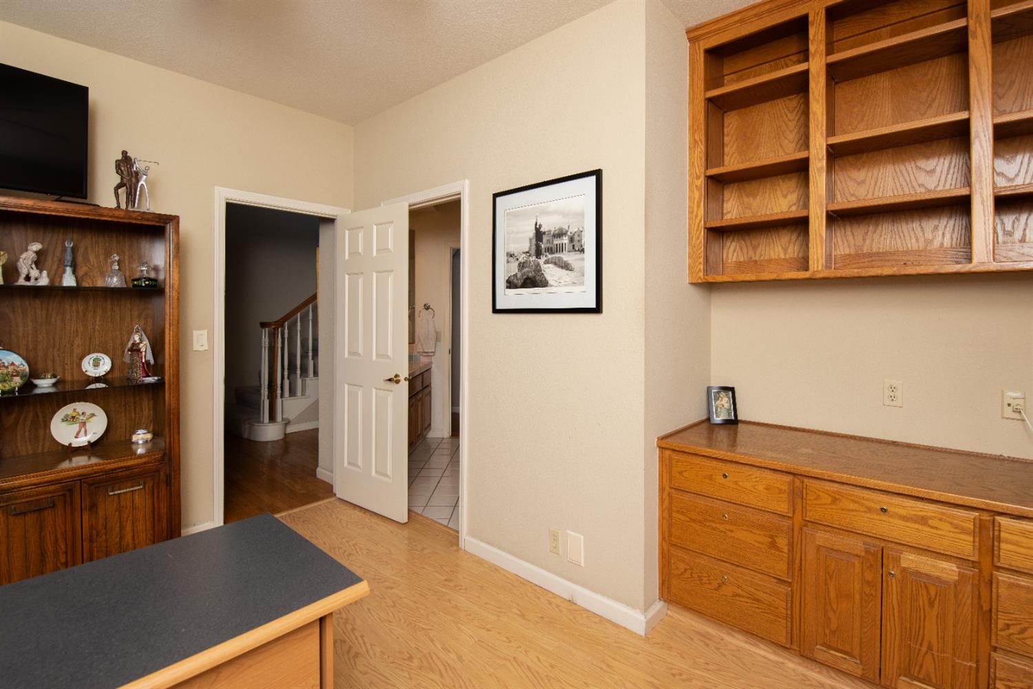 2705 Lake Front Court Modesto, CA 95355 - Photo 15 of 50 a kitchen with stainless steel appliances cabinets and a refrigerator