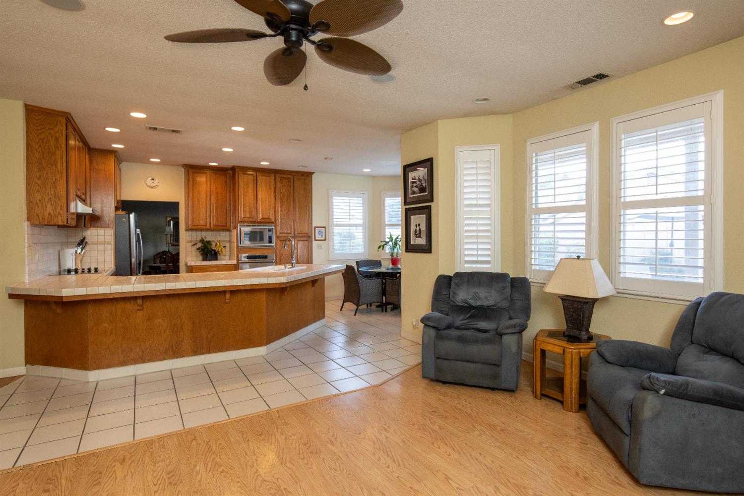 2705 Lake Front Court Modesto, CA 95355 - Photo 21 of 50 a living room with furniture and kitchen view