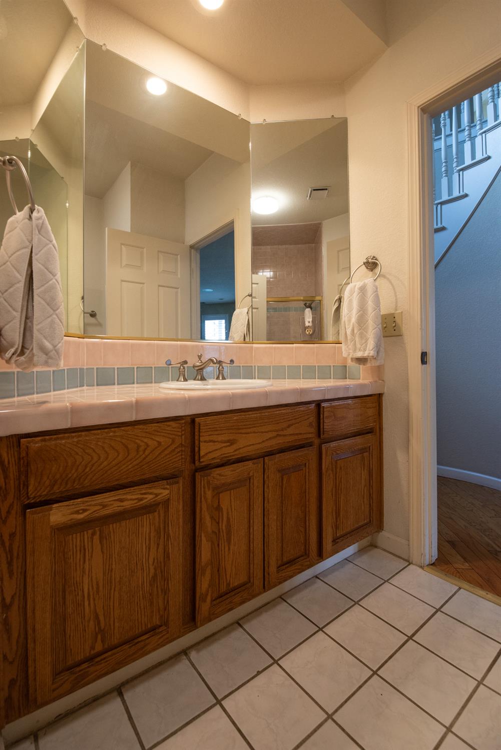 2705 Lake Front Court Modesto, CA 95355 - Photo 23 of 50 a bathroom with a sink and a mirror