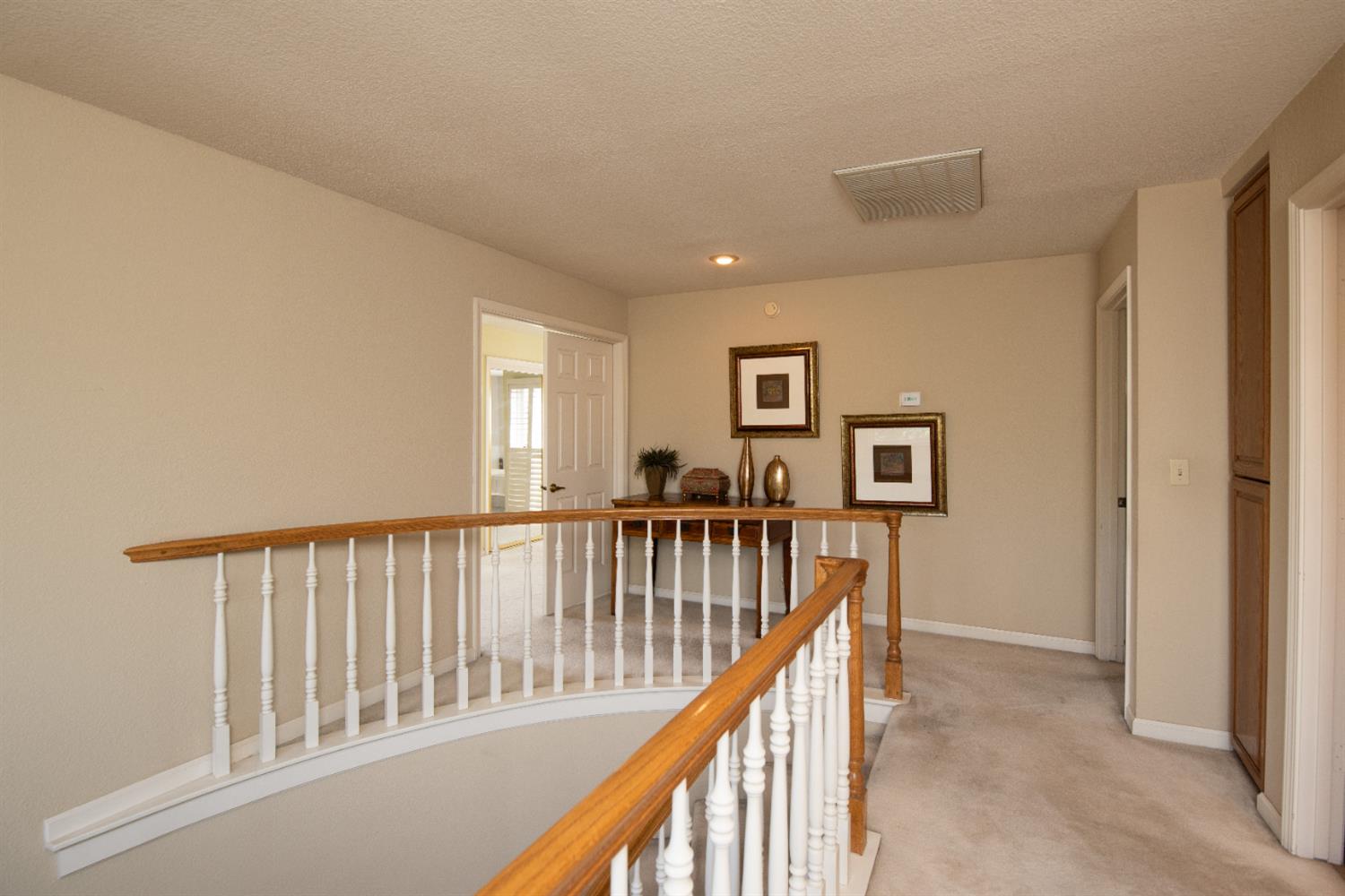 2705 Lake Front Court Modesto, CA 95355 - Photo 26 of 50 a view of a hallway with workspace