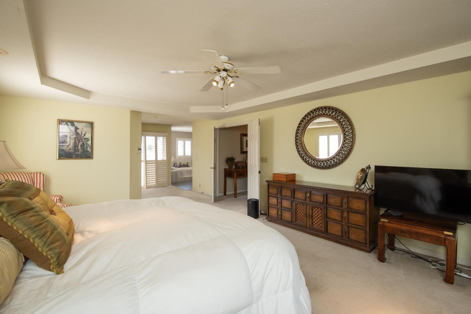 2705 Lake Front Court Modesto, CA 95355 - Photo 30 of 50 a bed room with a bed window and a television