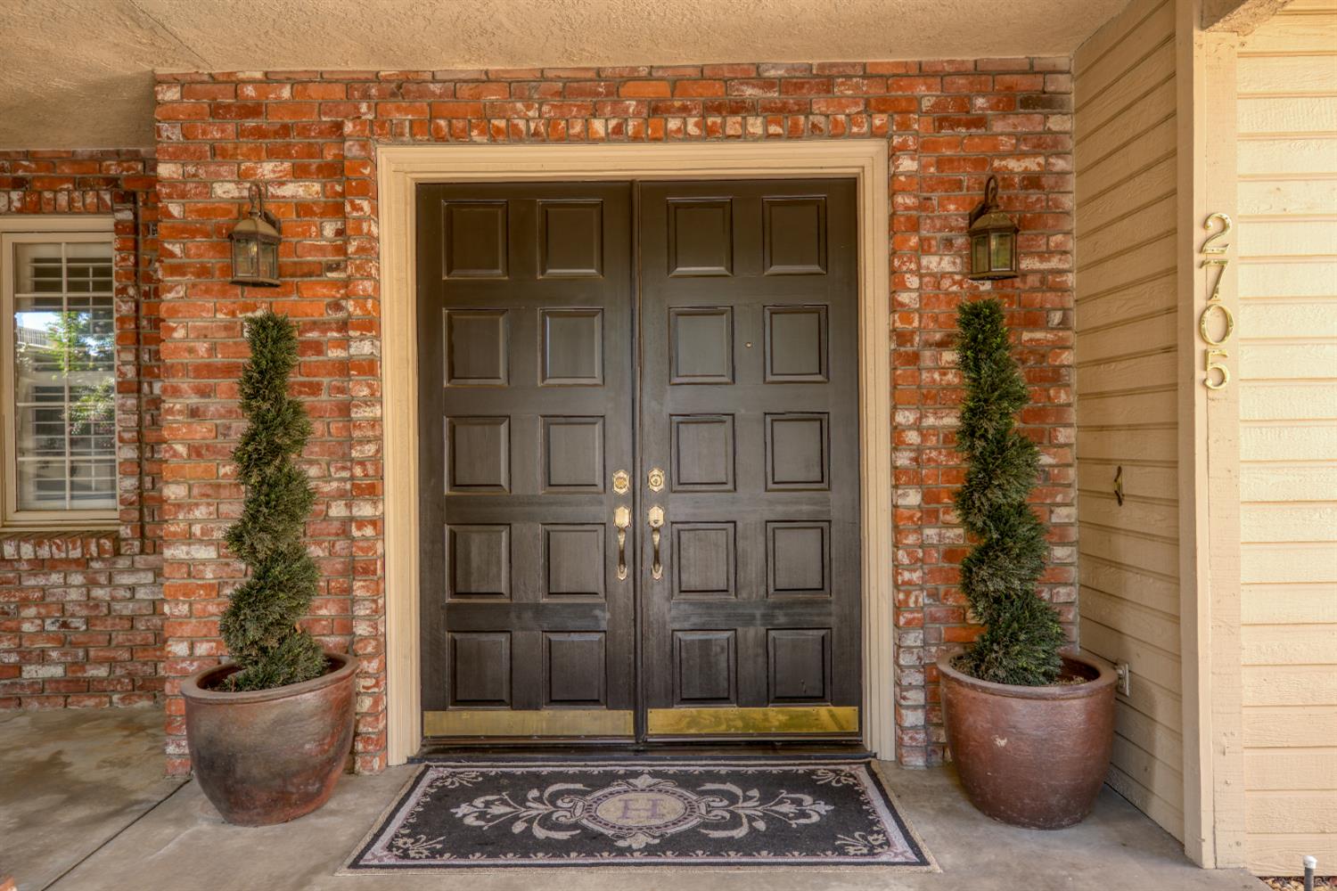 2705 Lake Front Court Modesto, CA 95355 - Photo 4 of 50 a view of a entryway door front of house