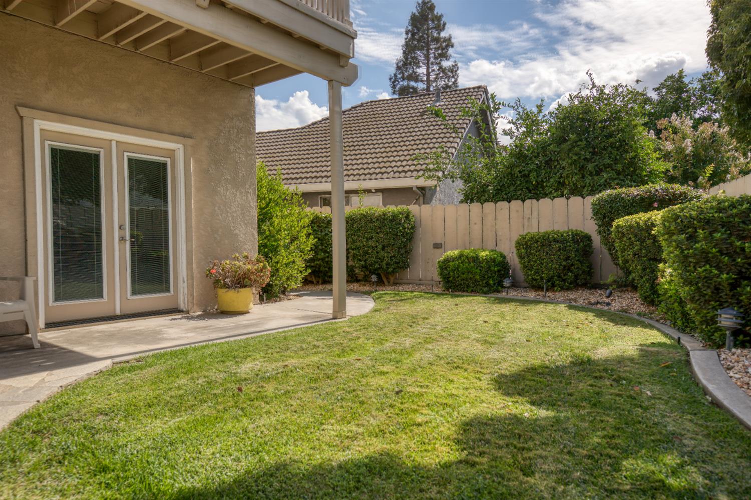 2705 Lake Front Court Modesto, CA 95355 - Photo 49 of 50 a front view of a house with garden