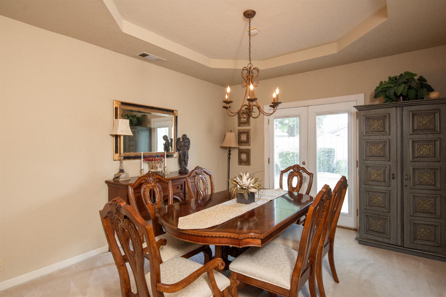 2705 Lake Front Court Modesto, CA 95355 - Photo 7 of 50 a view of a dining room with furniture window and outside view