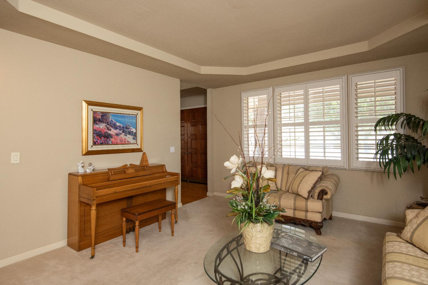 2705 Lake Front Court Modesto, CA 95355 - Photo 8 of 50 a living room with furniture and a large window