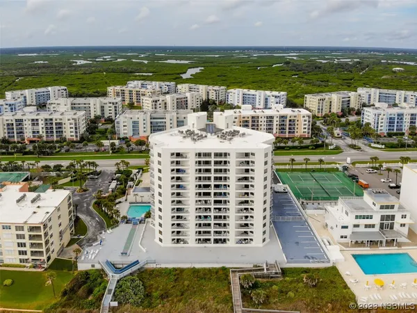 a view of a city with tall buildings