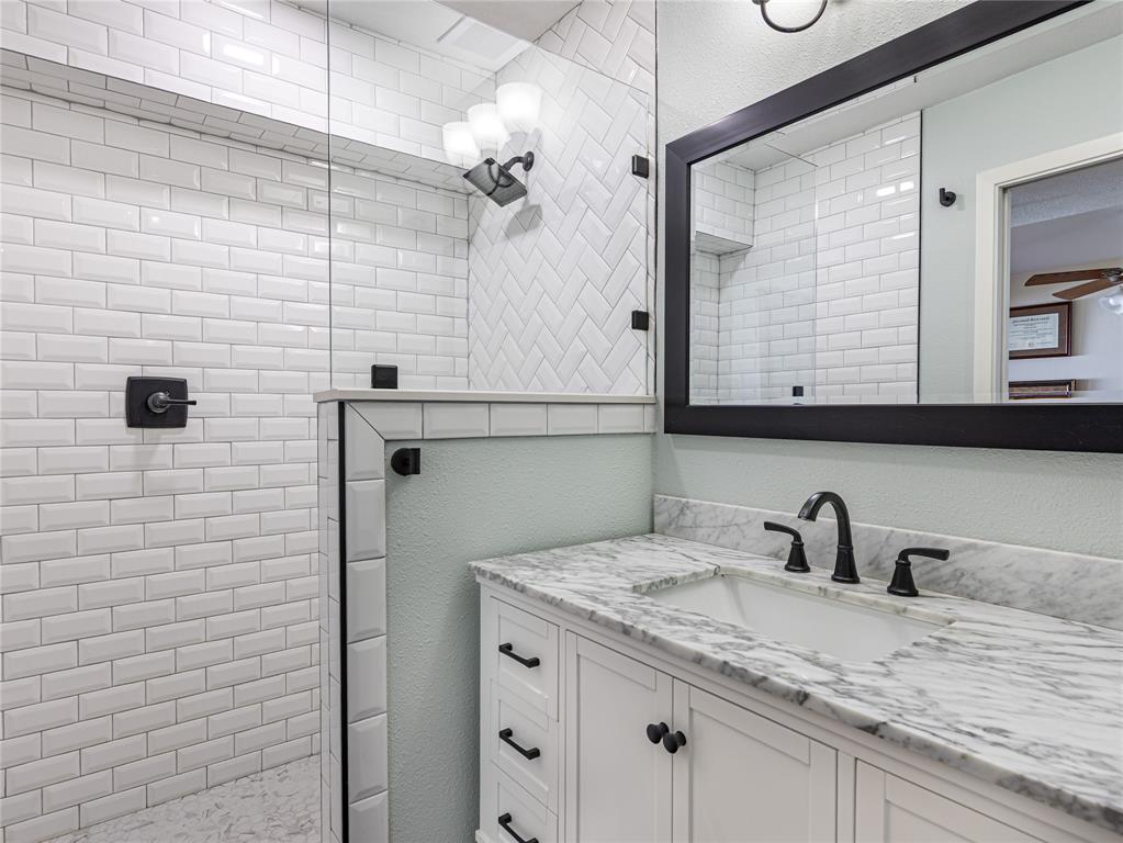 9999 Boat Club Road, Unit 601 Fort Worth, TX 76179 - Photo 26 of 39 Walk-in shower and well-appointed finishes throughout.