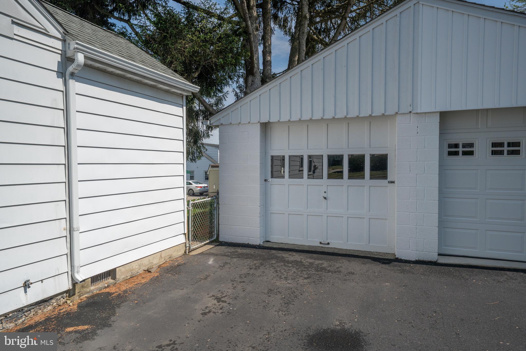 1305 Center Road Drexel Hill, PA 19026 - Photo 33 of 37 a view of a house with a garage