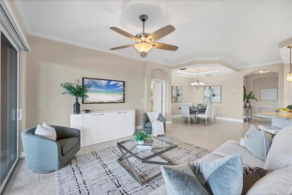 a kitchen with refrigerator and cabinets