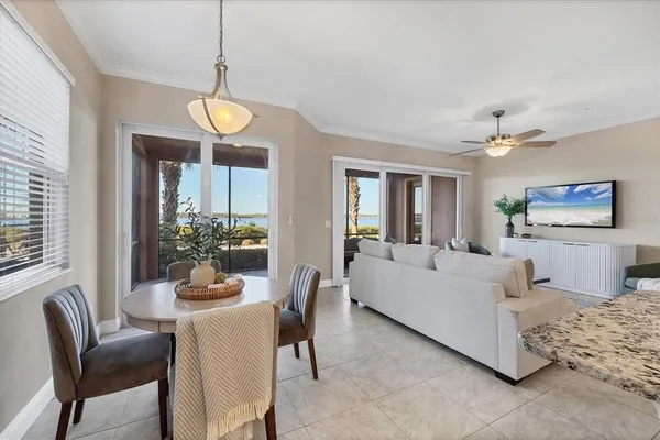 a bathroom with a granite countertop shower a sink and a mirror