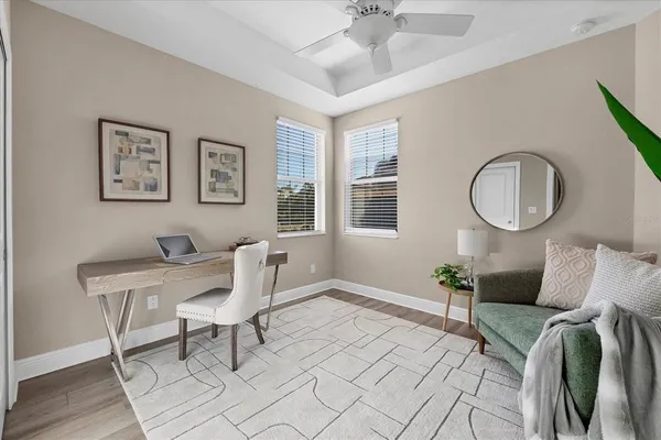 a view of a building with a yard