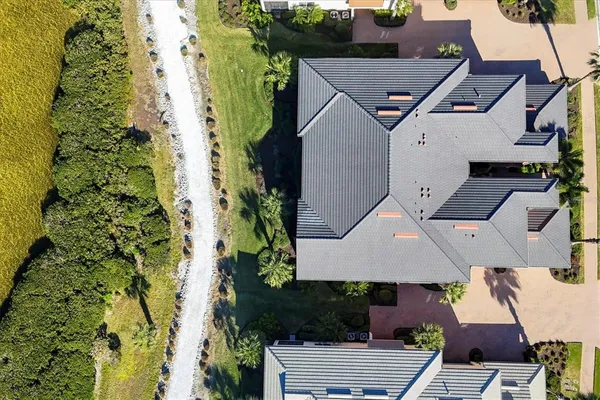 a view of a swimming pool and an outdoor seating