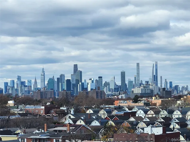 a view of a city with lot of cars