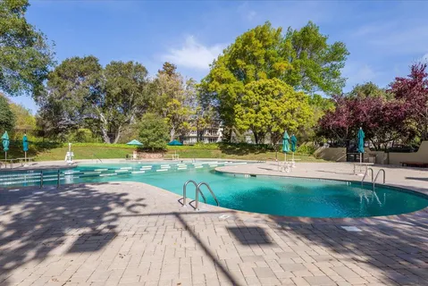 a view of a backyard with green space