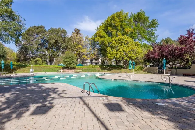 a view of a backyard with green space