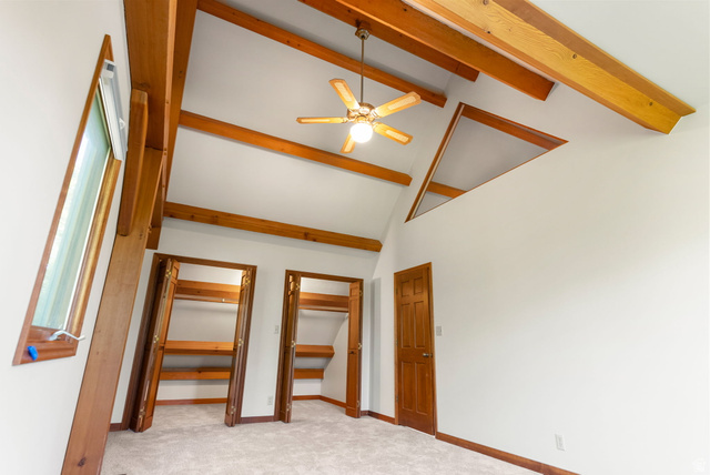 435 Canyon Road Millville, UT 84326 - Photo 36 of 113 Vaulted ceiling featuring exposed wood beams and a ceiling fan