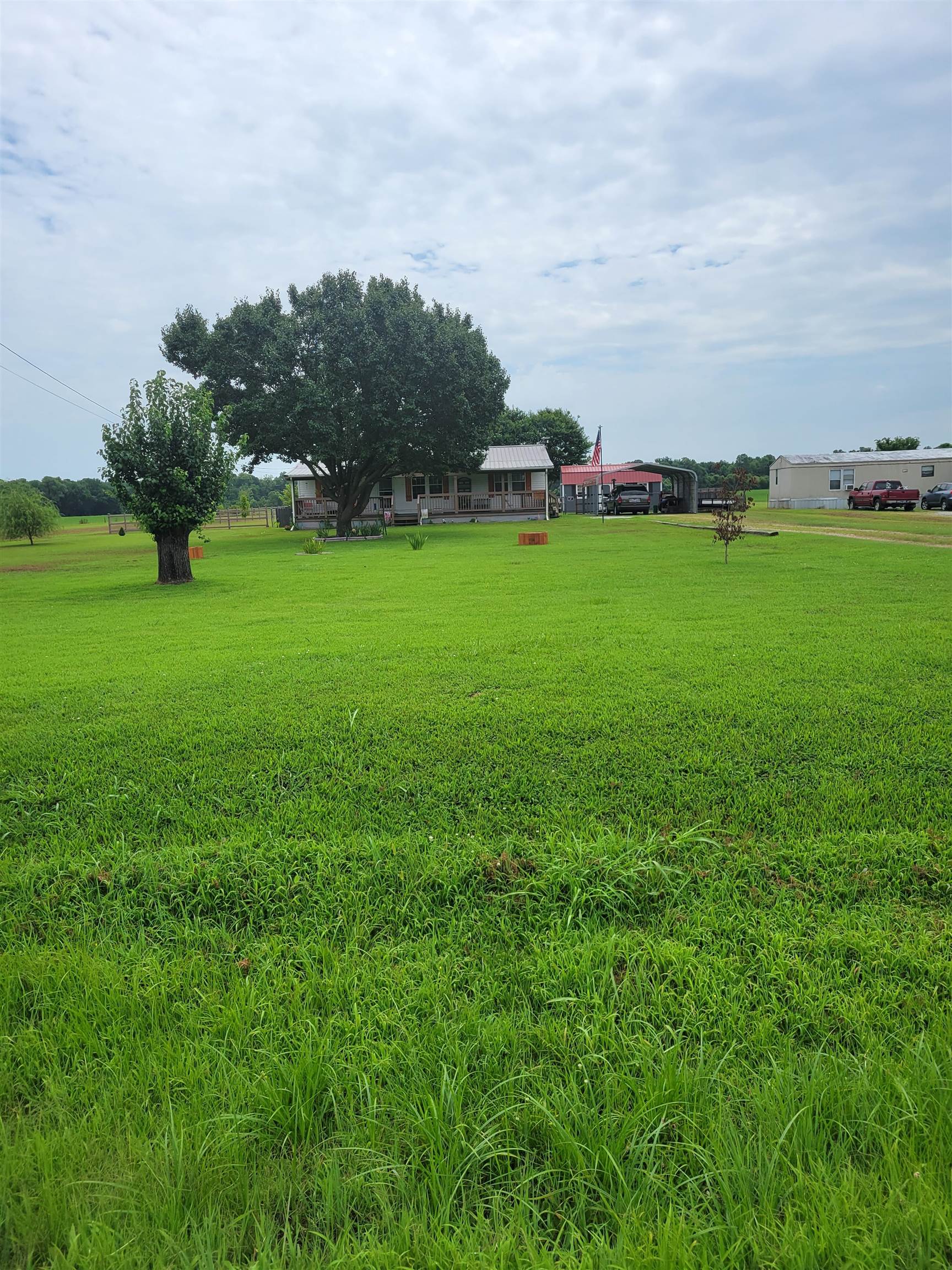 2496 Detroit Road Burlison, TN 38015 - Photo 1 of 25 View of grassy yard