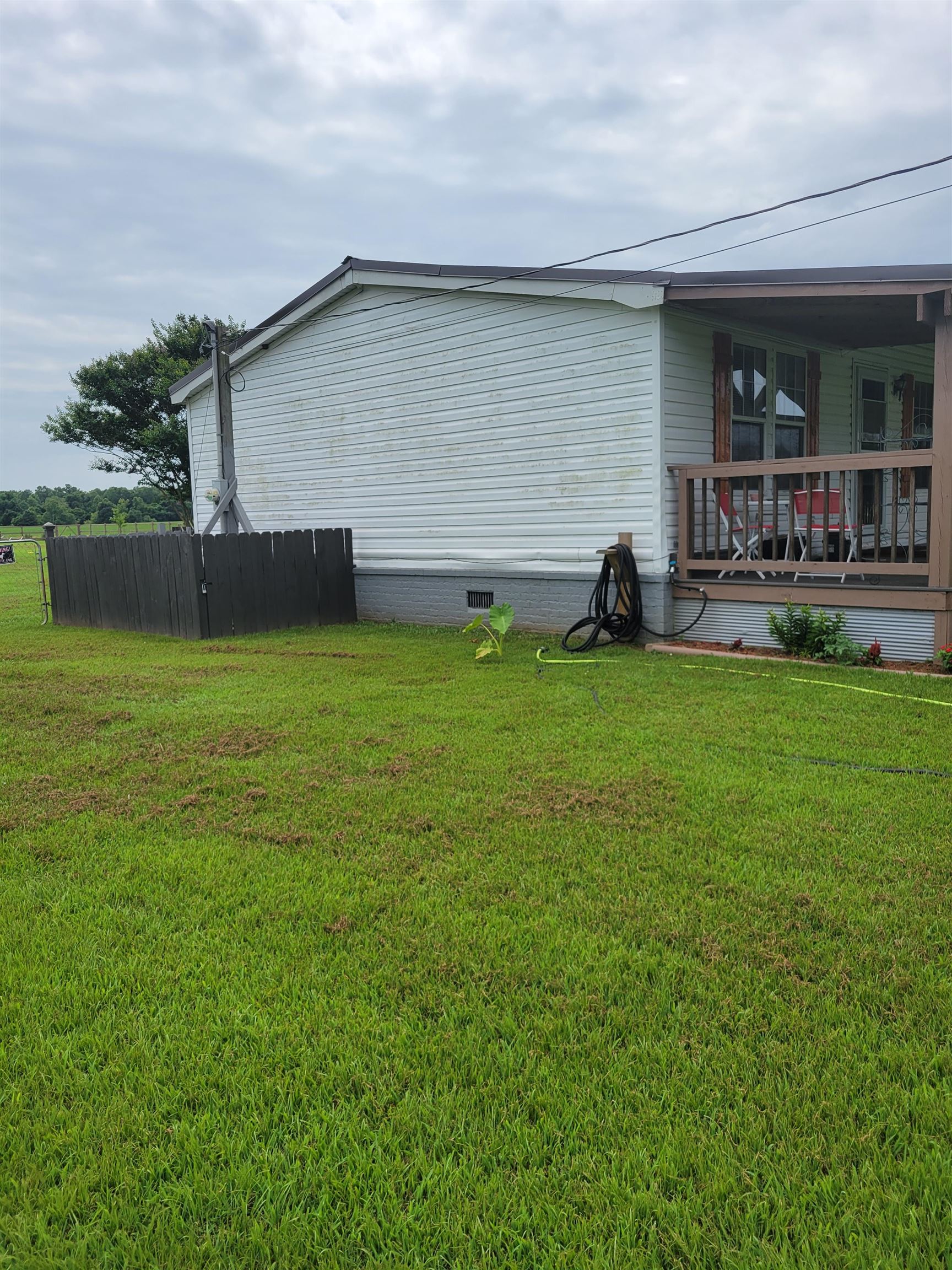2496 Detroit Road Burlison, TN 38015 - Photo 2 of 25 View of side of property featuring crawl space