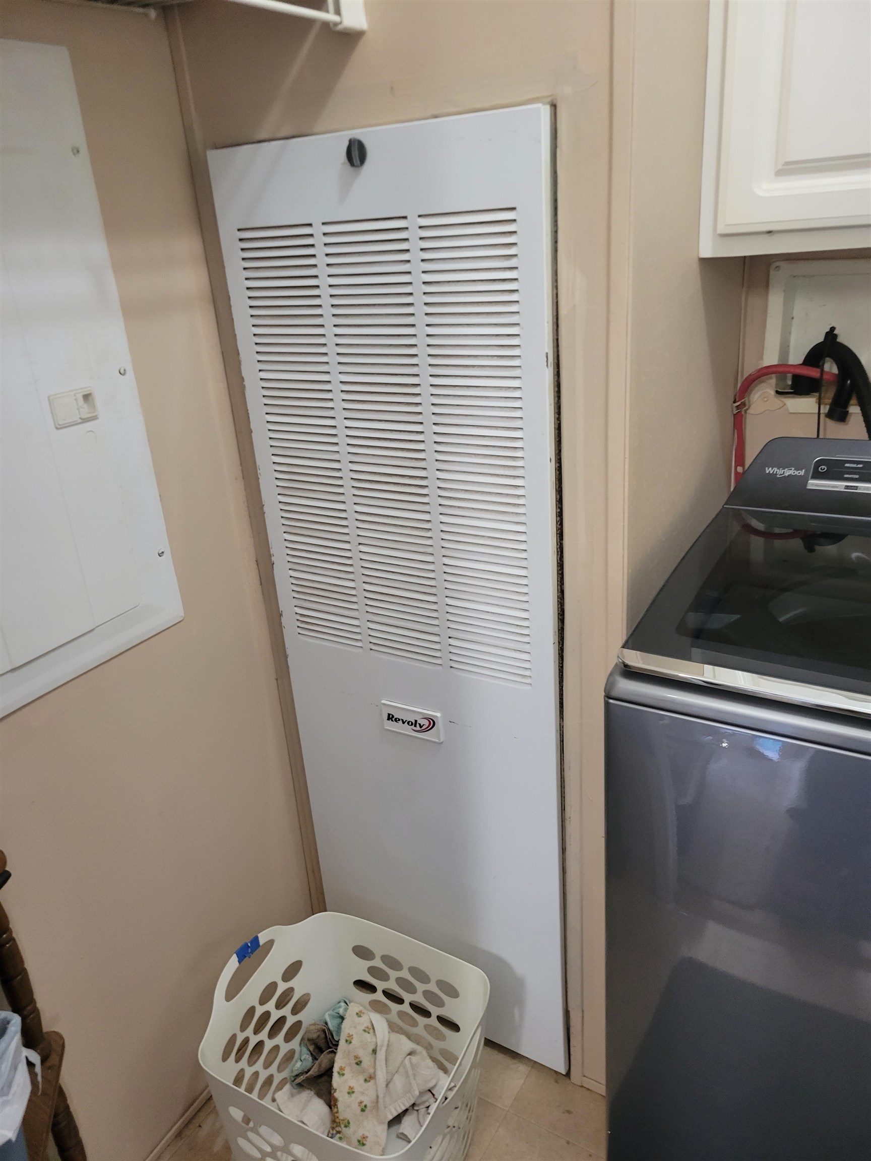 2496 Detroit Road Burlison, TN 38015 - Photo 25 of 25 Laundry area with a heating unit, cabinet space, and washer / dryer