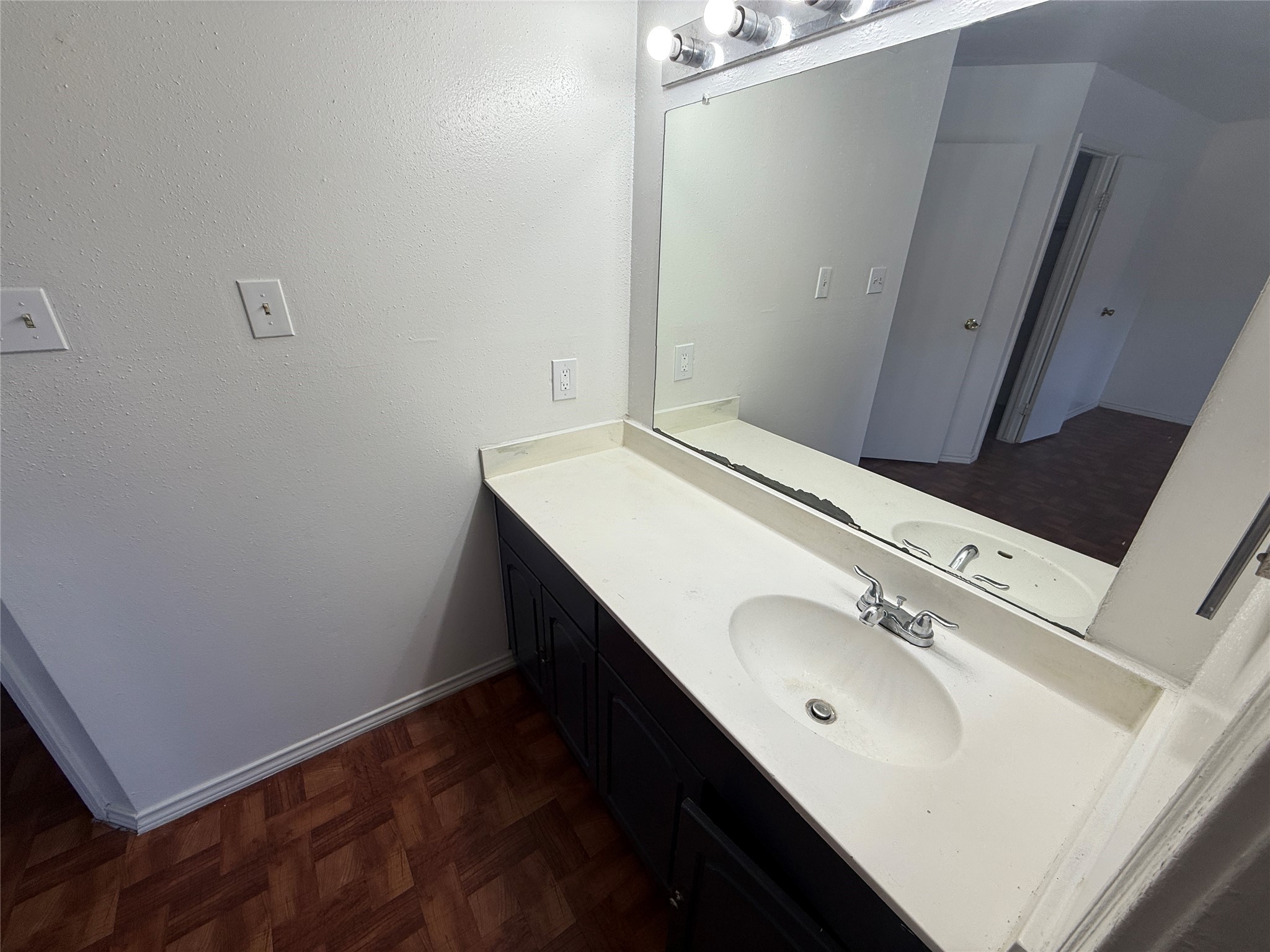 7200 West T C Jester Boulevard, Unit 2604 Houston, TX 77088 - Photo 13 of 14 a bathroom with a sink and a mirror