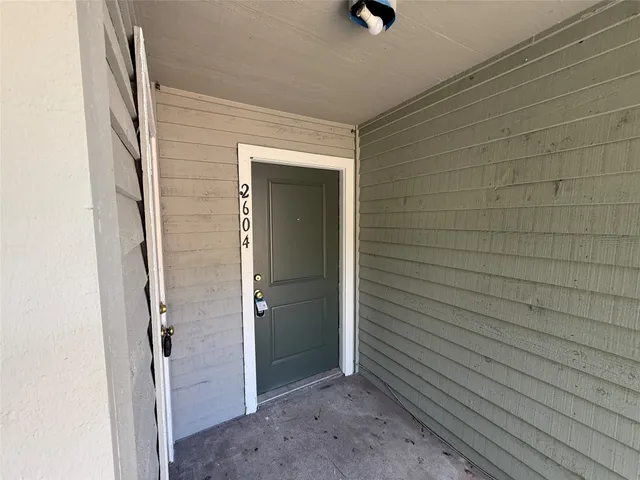 a kitchen with a sink cabinets and appliances