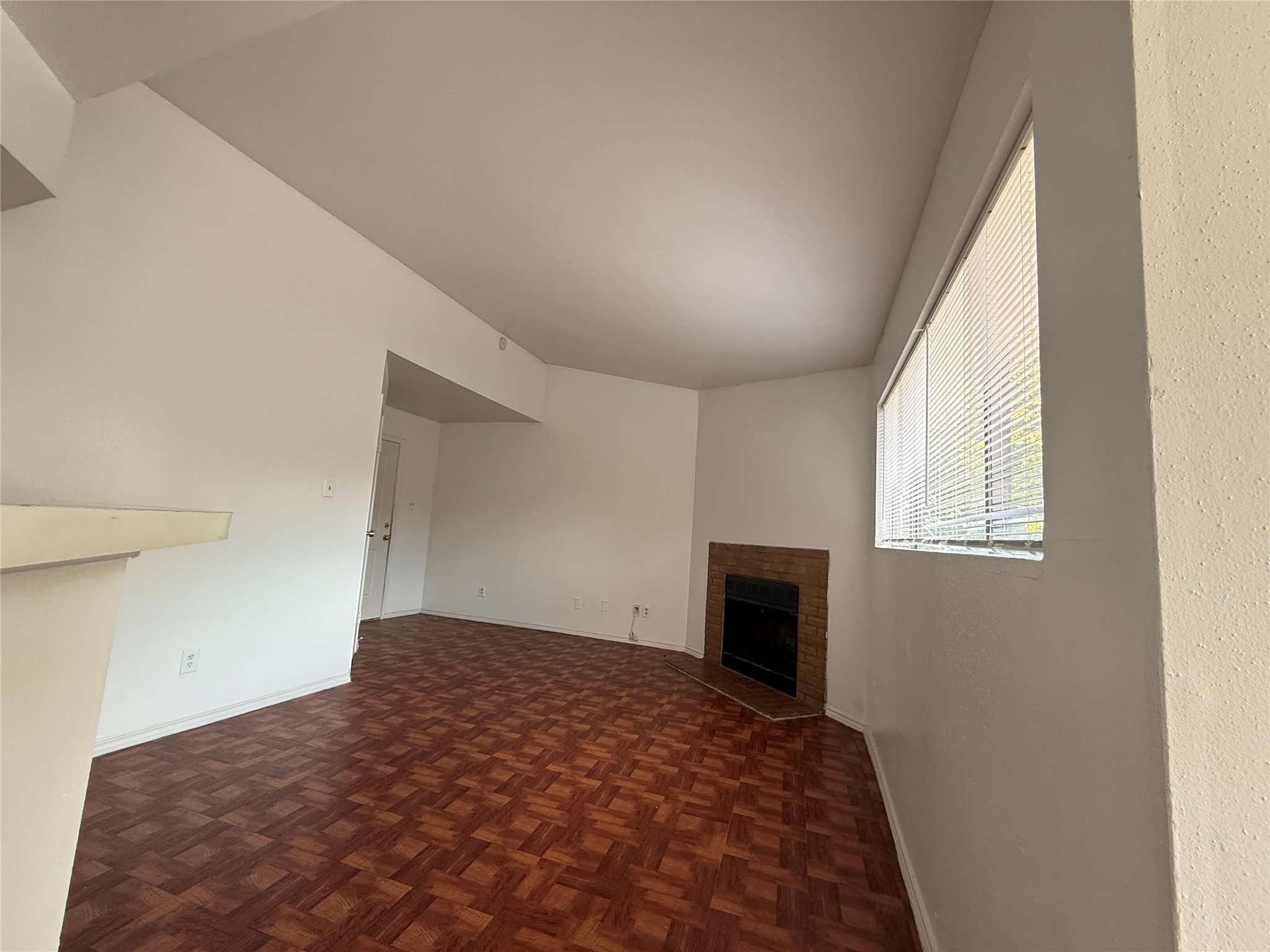 7200 West T C Jester Boulevard, Unit 2604 Houston, TX 77088 - Photo 5 of 14 a bedroom with a bed and a fireplace