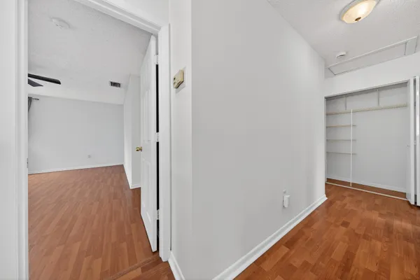 an aerial view of multiple houses with yard