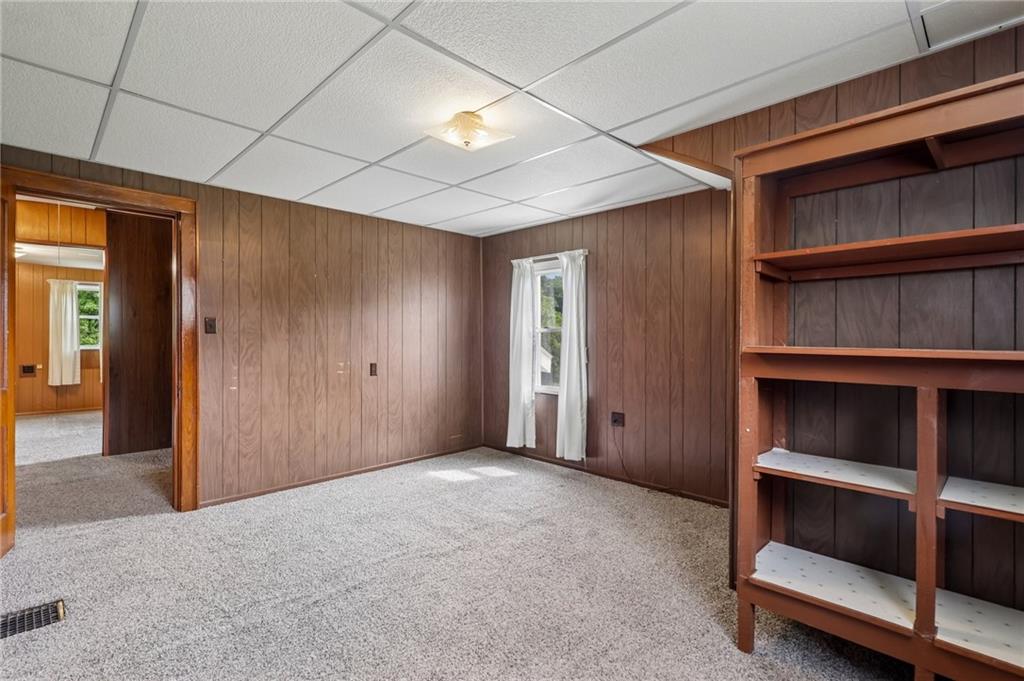 316 Orr Avenue Apollo, PA 15613 - Photo 31 of 47 a view of an empty room with cabinet and stairs