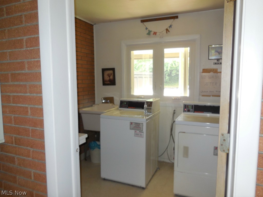 5721 Som Center Road, Unit 21 Solon, OH 44139 - Photo 8 of 11 Laundry Room at top of stairs in hallway