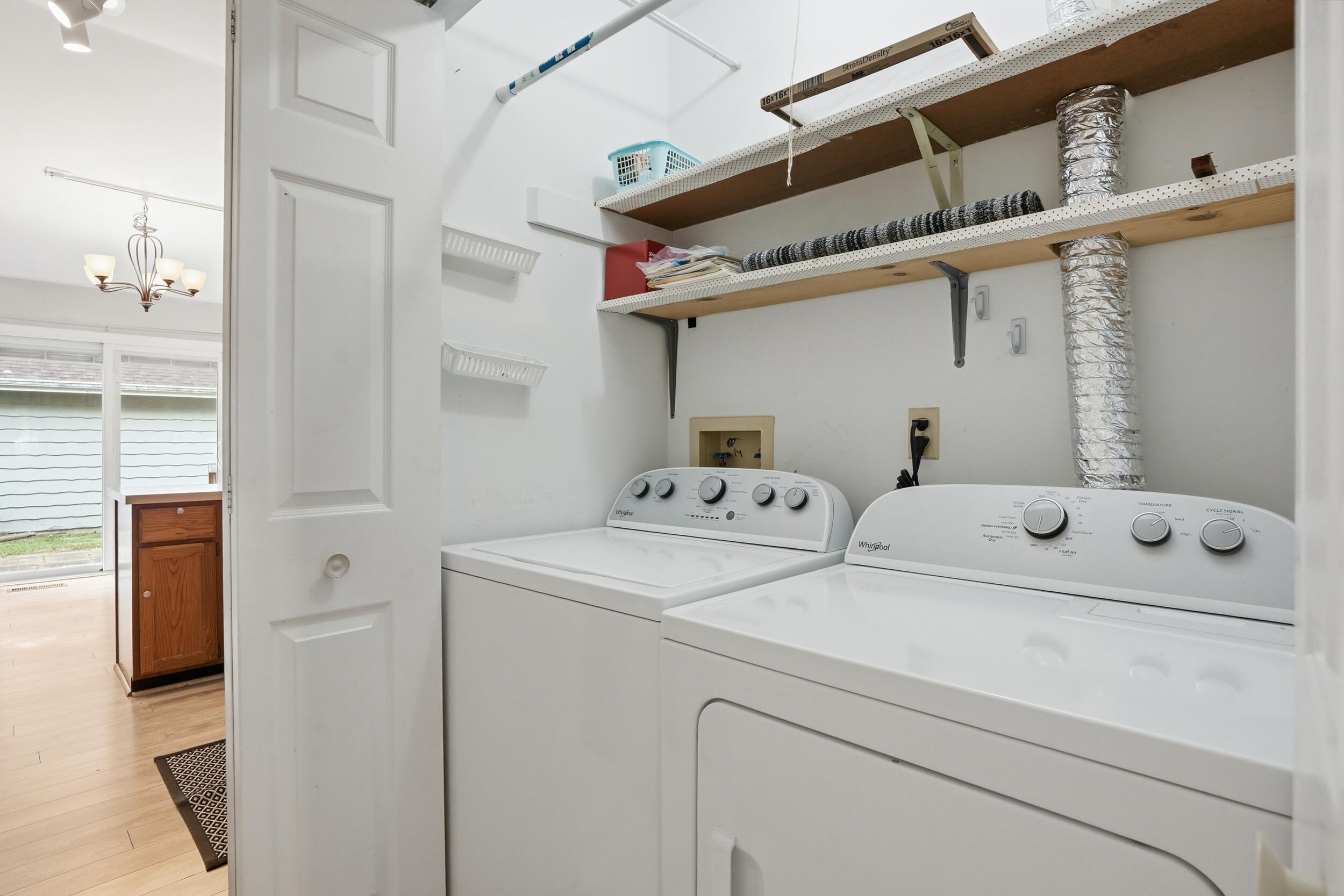 225 Clinton Street Lowell, IN 46356 - Photo 19 of 22 a utility room with dryer and washer