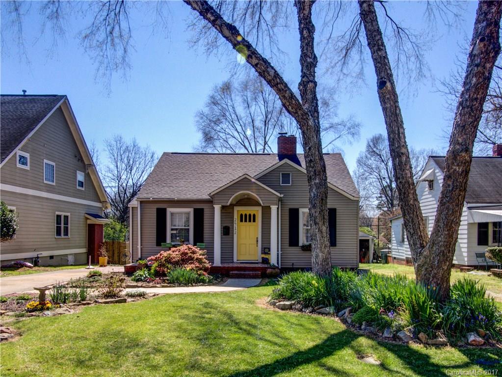 2412 Laburnum Avenue Charlotte, NC 28205 - Photo 1 of 24 a front view of a house with yard and green space