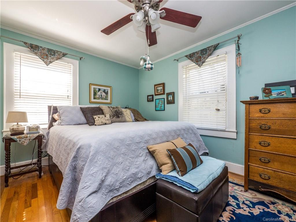 2412 Laburnum Avenue Charlotte, NC 28205 - Photo 16 of 24 a bedroom with a bed and window