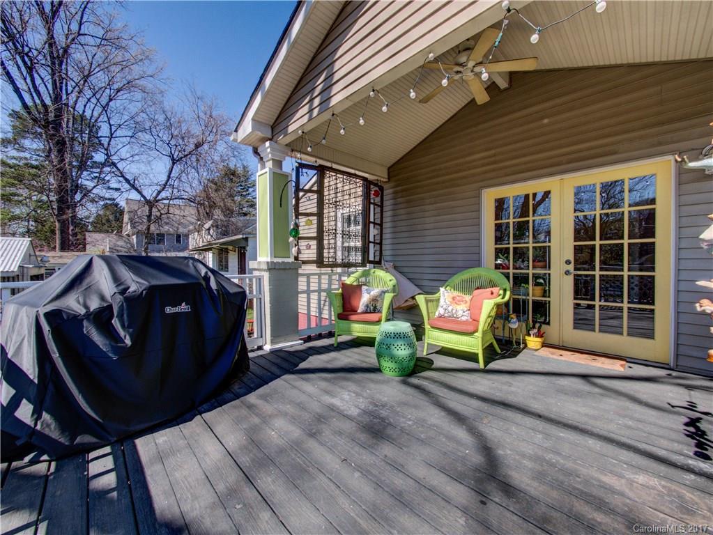 2412 Laburnum Avenue Charlotte, NC 28205 - Photo 19 of 24 a front view of a house with outdoor seating